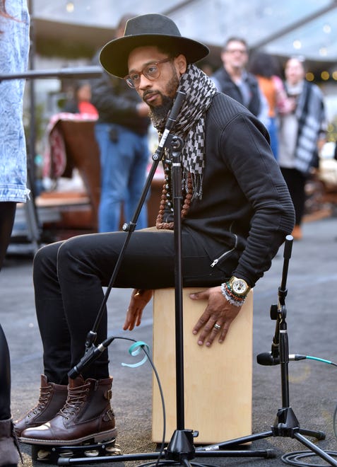 J.R. Le Mon, aka 'JRGotTheHits,' plays the cajon and tambourine with R&B singer Raye Williams (not pictured).