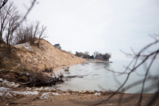 The waters of Lake Michigan now cover the location which used to be North Lakeshore Drive at Juniper Beach in Golden Township. Part of North Lakeshore Drive has fallen into Lake Michigan due to high lake levels.