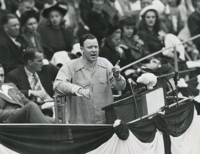 Walter Reuther speaks to a crowd on Labor Day at Detroit City Hall in 1948. "Management has no divine rights," he said. "Management has only functions, which it performs well or poorly. The only prerogatives which management has lost turned out to be usurpations of power and privilege to which no group of men have exclusive right in a democratic nation."