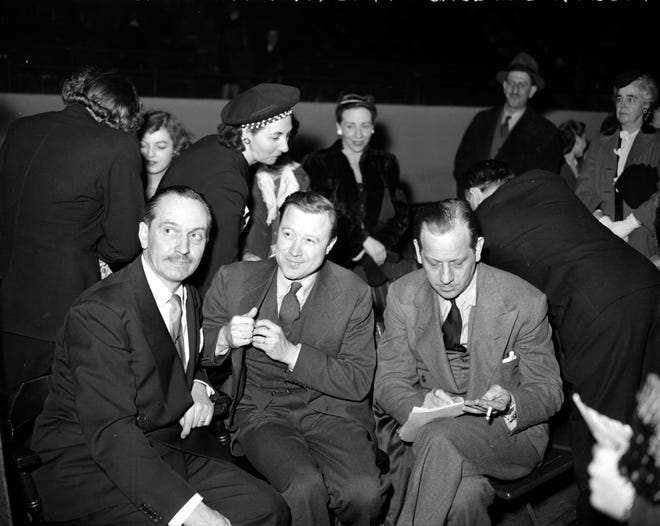 Reuther enlisted the support of some prominent members of the Screen Actors Guild -- Frederick March, left, and Melvyn Douglas -- at a UAW rally for striking GM workers in February 1946. That year, he would be elected president of the UAW.