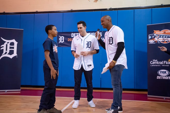 Twelve-year-old Jeremiyah Jackson, of Detroit, is asked baseball trivia by Detroit Tigers pitcher Matthew Boyd and second baseman Jonathan Schoop, as the Detroit Tigers winter caravan made a stop at the S.A.Y. Detroit Play center in Detroit, January 23, 2020.