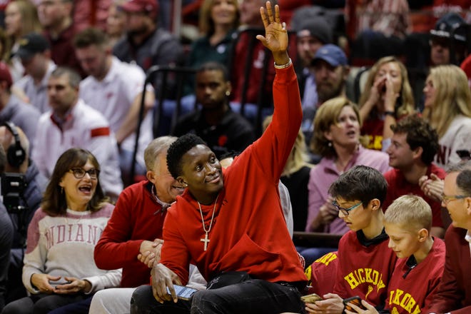 Former Indiana player and Indiana Pacers guard Victor Oladipo waves as he introduced in the first half.