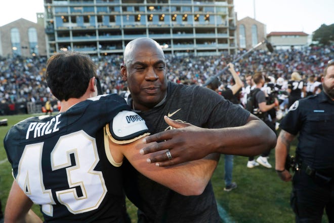 Colorado head coach Mel Tucker, right, congratulates kicker Evan Price after he kicked the winning field goal as time expired against Stanford Nov. 9, 2019, in Boulder, Colo. Colorado won 16-13.