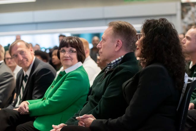 (From left) MSU president Samuel Stanley, Chair of the Board of Trustees Dianne Byrum, head basketball coach Tom Izzo, and his wife Lupe listen as Mel Tucker speaks to the media after being introduced as the next head football coach for Michigan State University during a press conference at the Breslin Student Center, in East Lansing, February 12, 2020.