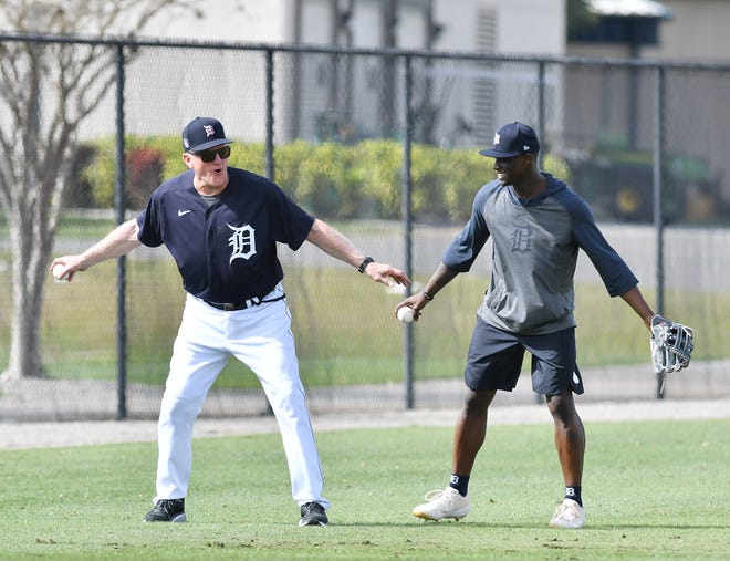 Tigers minor league outfield and base running coordinator Gene Roof, left, works with outfielder Daz Cameron during voluntary workout.