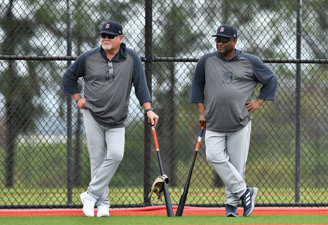 From left, Tigers manager Ron Gardenhire and bench coach Lloyd McClendon watch catchers throwing practice. Gardenhire is wearing a pair of shoes given to him by Mattrhew Boyd of, whom Gardenhire sometimes makes fun.