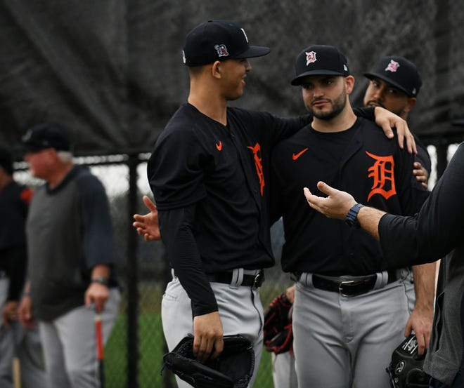 From left, Tigers pitchers Franklin Perez and Bryan Garcia talk in the bullpen.