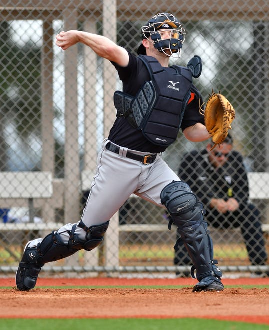 Tigers catcher Jake Rogers makes a throw from home during drills making throws to different bases at Detroit Tigers spring training in Lakeland, Fla. on Feb. 14, 2020.   
(Robin Buckson / Detroit News)