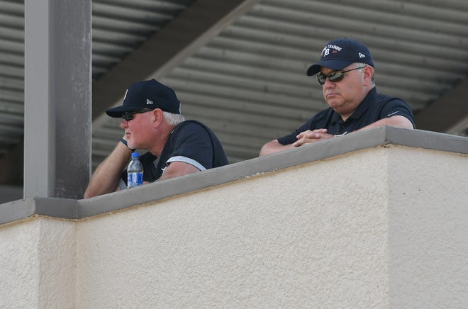 From left, Tigers manager Ron Gardenhire and general manager Al Avila watch the action on the fields from overhead at Detroit Tigers spring training.