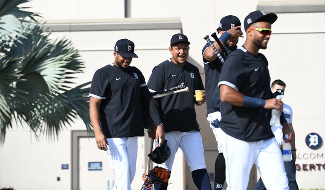 From left, Tigers' Jeimer Candelario, Miguel Cabrera, Dawel Lugo and Willi Castro head to the fields at Detroit Tigers spring training in Lakeland, Fla. on Feb. 17, 2020.