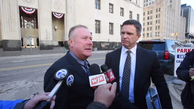 Former United Auto Workers official Mike Grimes, left, pleaded guilty to wire fraud conspiracy and money laundering charges, admitting he received $1.5 million in kickbacks from a union contractor. He was sentenced to 28 months in prison on Feb. 19, 2020.