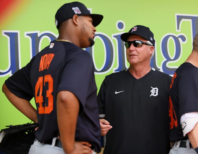 From left, Tigers pitcher Ivan Nova listens to pitching coach Rick Anderson after the top of the second inning.