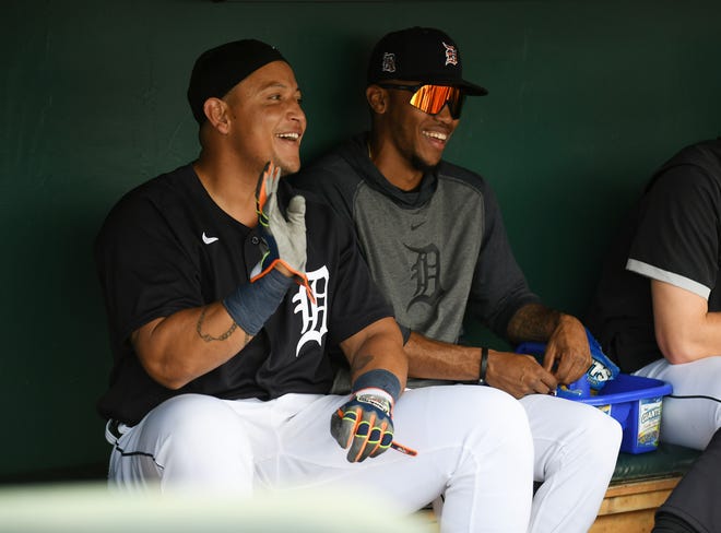From left, Tigers' Miguel Cabrera keeps it light in the dugout with teammates, next to outfielder Jose Azocar.