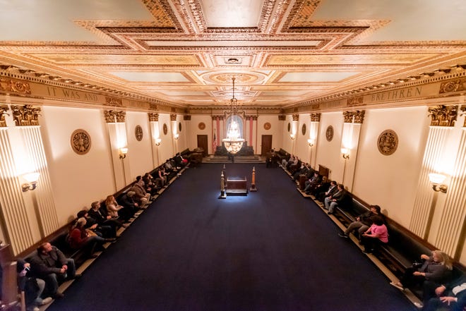 A tour group sits and listens about the Corinthian lodge room during a tour of the Masonic Temple, in Detroit, February 23, 2020.