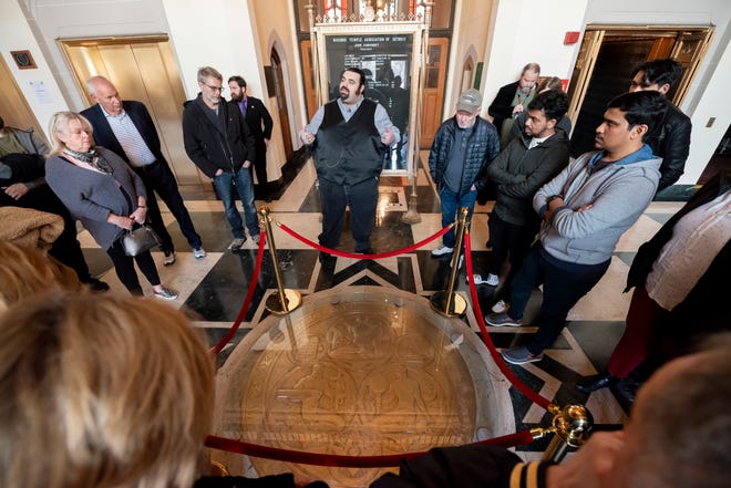 Docent Nudal Zakhim gives a talk about the seal of the Masons in the floor of the lobby during a tour of the Masonic Temple, in Detroit, February 23, 2020.