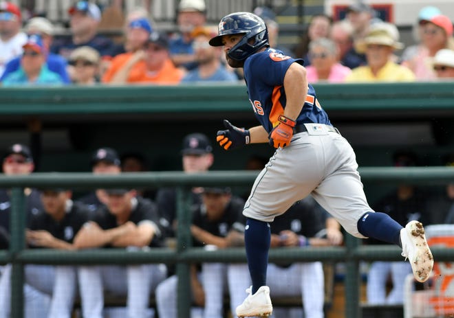 Astros' Jose Altuve doubles in the third inning.