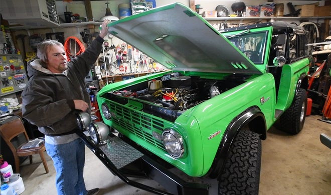 "I built this like 27 years ago and we take it every year up to Silver Lake sand dunes and it's fast"  comments Tom Carper in one of several garages he has filled with Broncos, parts and Ford Bronco collectibles at his "Bronco Ranch."