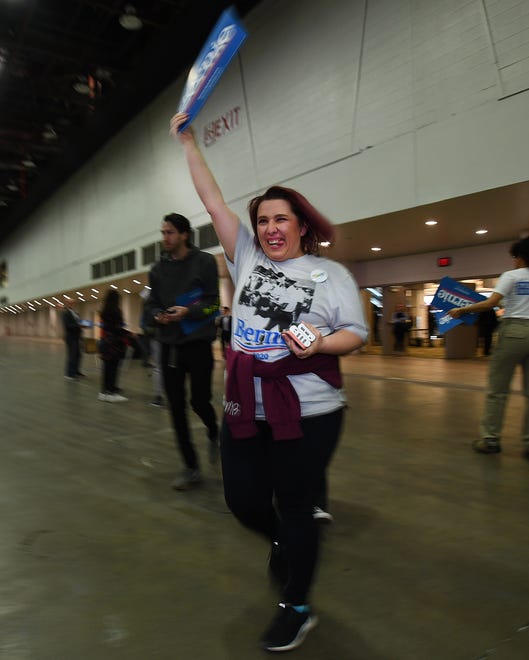 Bex Buckelew of Saginaw is one of the first to arrive for a Bernie Sanders campaign rally at TCF Center in Detroit, Friday.