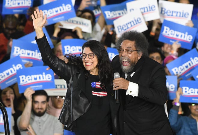Congresswoman Rashida Tlaib and political activist Cornel West stump for presidential candidate Bernie Sanders at TCF Center in Detroit, Friday.