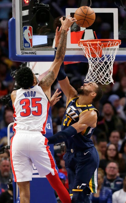 Detroit Pistons forward Christian Wood (35) takes a shot over Utah Jazz center Rudy Gobert (27) during the second half.