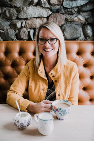 Sarah Macklem of The Yellow Cape Cod (theyellowcapecod.com) has been blogging about interior design since 2008 and offers online design services. She calls her style "updated traditional."