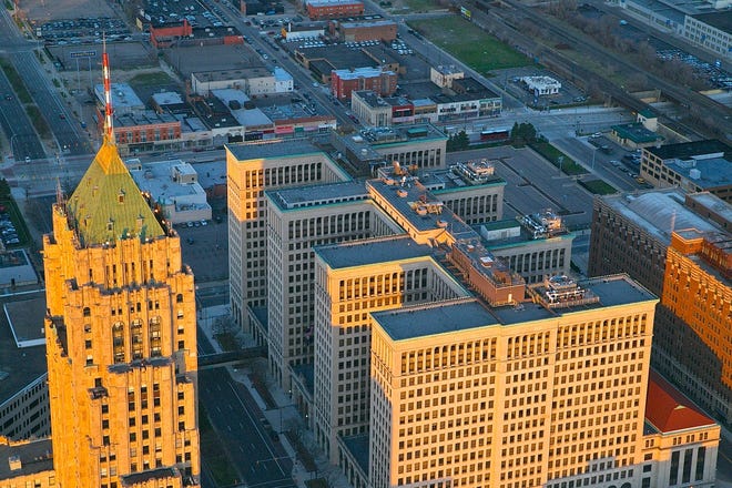 The 1928 Fisher Building, left, and the 1920 General Motors Building across West Grand Boulevard.