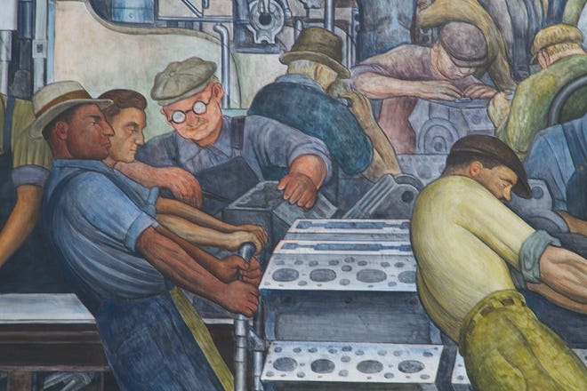 Many, including the Kahn family, believe the "merry foreman" with the spectacles on the north wall of Diego Rivera's "Detroit Industry" is meant to be Kahn.