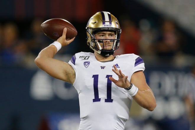 Sept. 5, at Washington (8-5, 4-5 Pac-12 in 2019): Former defensive coordinator Jimmy Lake takes over at head coach for the retired Chris Petersen at Washington with a new offensive coordinator (John Donovan) and starting quarterback, redshirt sophomore Jacob Sirmon (pictured), redshirt freshman Dylan Morris or freshman Ethan Garbers. Michigan will have a new starter at quarterback as well: redshirt junior Dylan McCaffrey, redshirt sophomore Joe Milton or possibly a grad transfer. It’s unlikely either passing game will look pretty this early in the season, keeping this one close. Prediction: Win