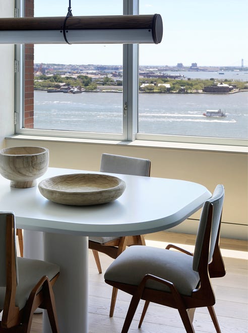 The owner of this Battery Park apartment focused resources on exquisite furnishings, say the designers, including a dining table by Collection Particuliere and vintage chairs purchased on 1st Dibs, a site they call “one of our favorite online resources.”