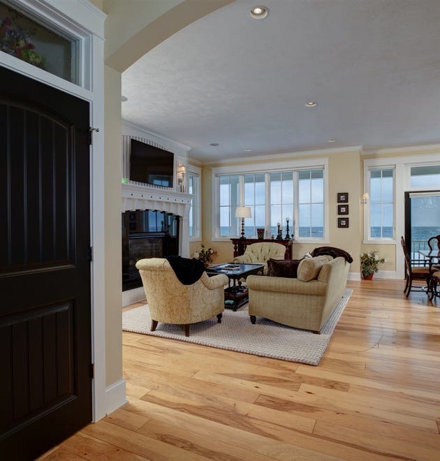 The home includes five bedrooms, three full baths, one half bath and two fireplaces at 3740 N. Beach Street in Bay Harbor, Mich.