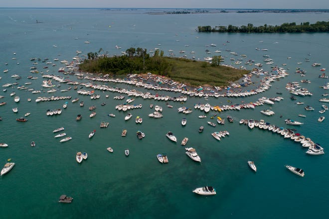 Boaters raft off during the annual Jobbie Nooner at Gull Island on Lake St. Clair, Friday, June 26, 2020.
