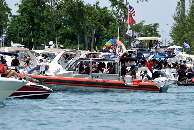 The U.S. Coast Guard patrols during the annual Jobbie Nooner at Gull Island on Lake St. Clair, Friday, June 26, 2020.