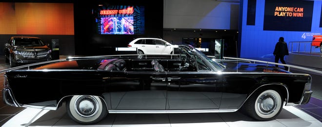 A long black 1965 Continental, featured in the HBO show Entourage, is on display at the North American International Auto Show at Cobo Center in Detroit, January 10, 2011.
