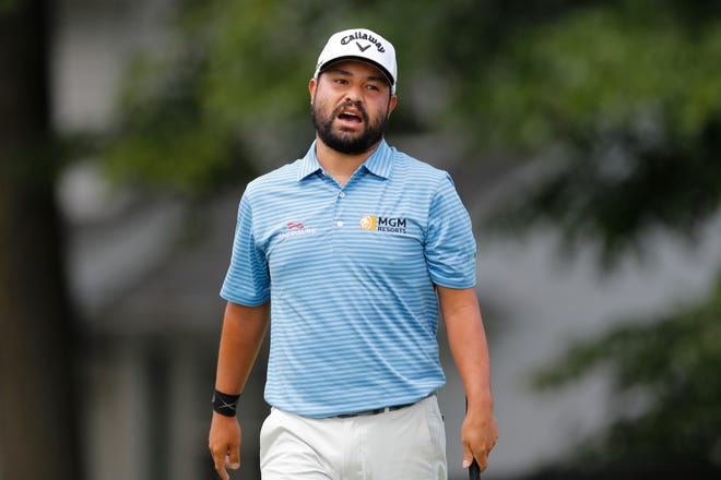 J.J, Spaun reacts after missing his putt for par on the ninth green during the first round of the Rocket Mortgage Classic.
