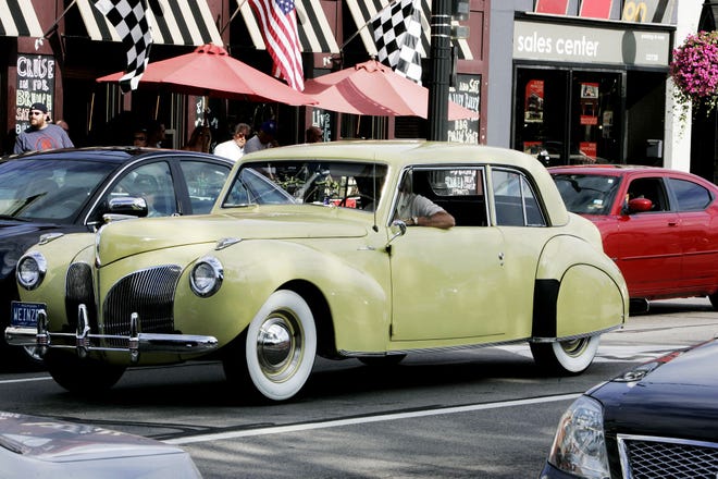 Jim Weinzrl of Sterling Heights, drives his 1941 Lincoln Continental during the 2008 Dream Cruise on Woodward Ave.