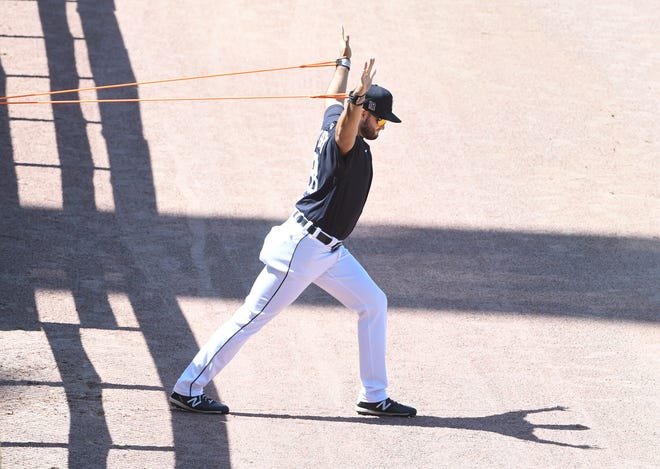 Pitcher Bryan Garcia uses bands to stretch out during Detroit Tigers training camp at Comerica Park in Detroit, Michigan on July 5, 2020.