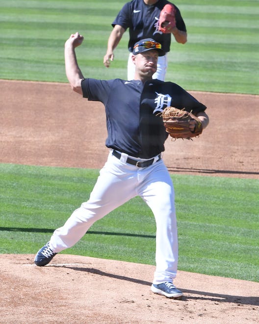 Jordan Zimmermann takes pitchers' fielding practice.