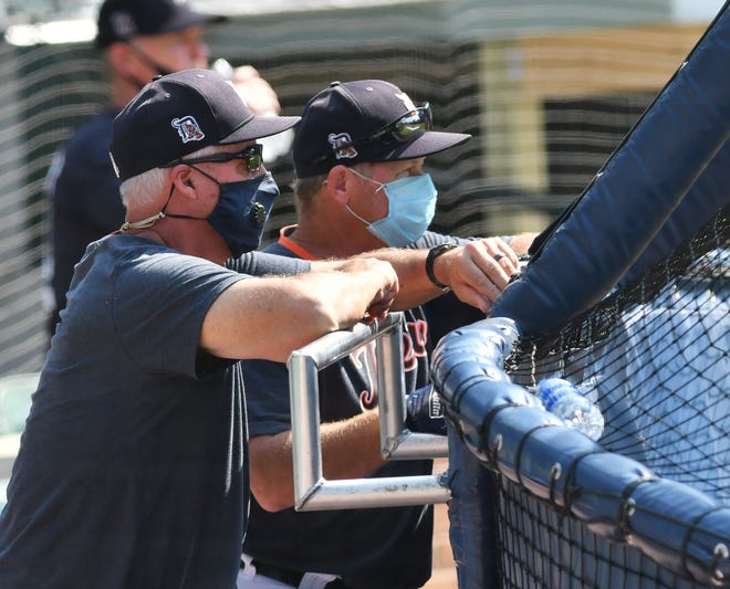 Tigers pitching coach Rick Anderson and hitting coach Joe Vavra watch Matthew Boyd pitch live batting practice.  Detroit Tigers work out at Comerica Park in Detroit on July 6, 2020.