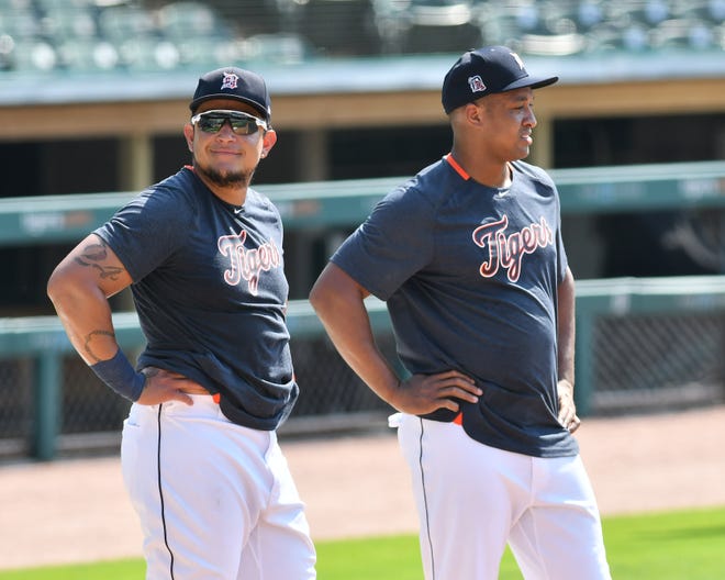 From left, Tigers' Miguel Cabrera smiles next to Jonathan Schoop.  Detroit Tigers work out at Comerica Park in Detroit on July 6, 2020.