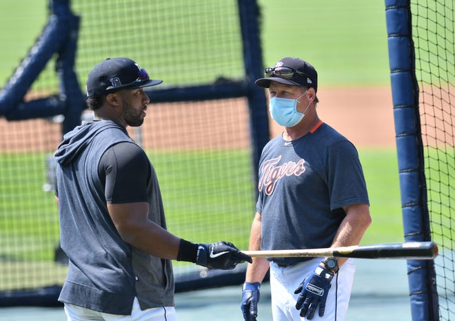 From left, Tigers' Christin Stewart talks with hitting coach Joe Vavra during live batting practice.  Detroit Tigers work out at Comerica Park in Detroit on July 6, 2020.