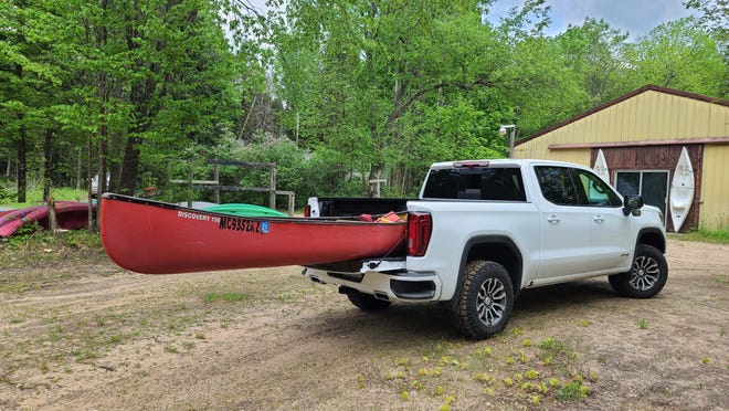 Have bed, will travel. The 2020 GMC Sierra AT4 came in handy when Detroit News auto critic Henry Payne needed to transport canoes in East Jordan, Michigan.