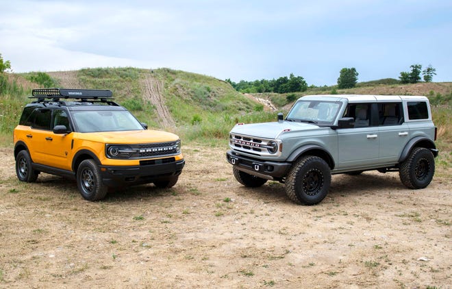 The Ford 2021 Bronco Sport, left, and Ford 2021 Bronco 4-door are pictured together at the Holly Oaks ORV Park in Holly, Mich on July 10, 2020.