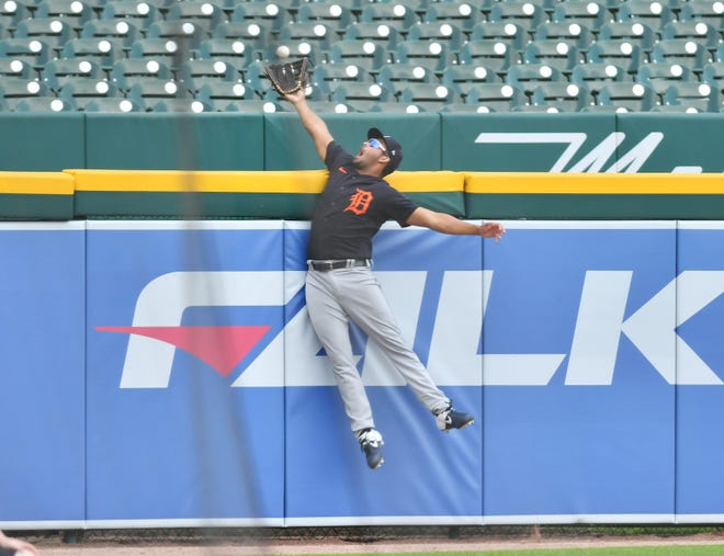 Non-roster invitee Riley Greene robs C.J. Cron of a home run during an intrasquad game at Detroit Tigers Summer Camp at Comerica Park in Detroit on July 13, 2020.