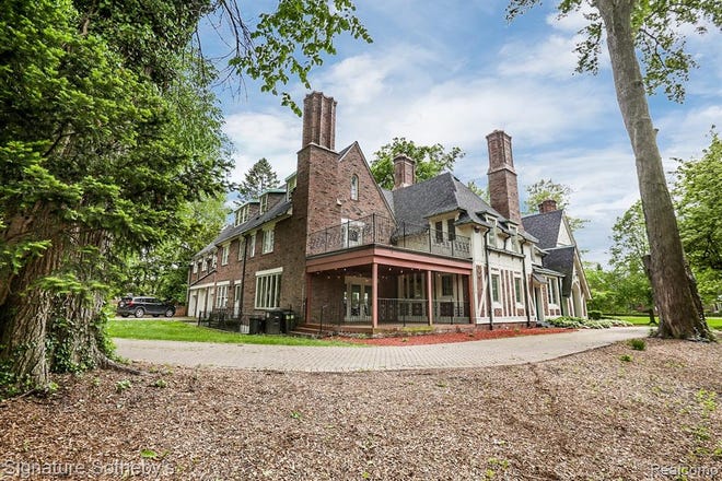 This spacious Grosse Pointe Farms historic Tudor home has been completely restored to its original glory with modern state-of-the-art updates.