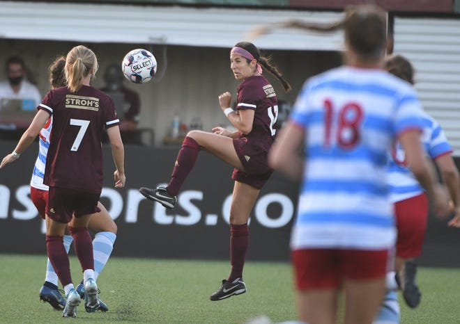 Detroit City FC's Kelsey McClafferty puts the ball back upfield in the first half.