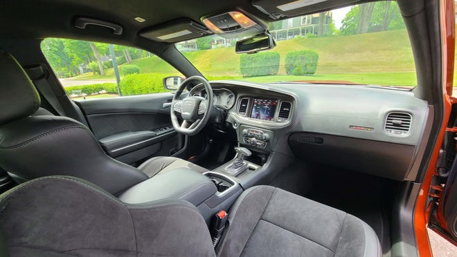 With its T-shifter, digital UConnect infotainment, and healthy storage space, the 2020 Dodge Charger Scat Pack Plus interior is ergonomically efficient.