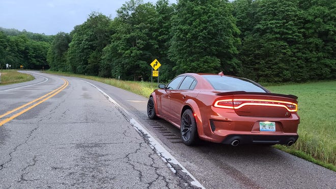 Tailpipes the size of the Alaskan pipeline and single-strip, LEF taillight. Yup, it's the 2020 Dodge Charger Scat Pack Plus.