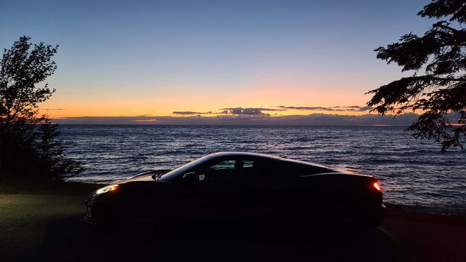 The lovely profile of the 2020 Chevy Corvette at sunset in northern Michigan. The 'Vette has huge bandwidth as a track — and trip — car.