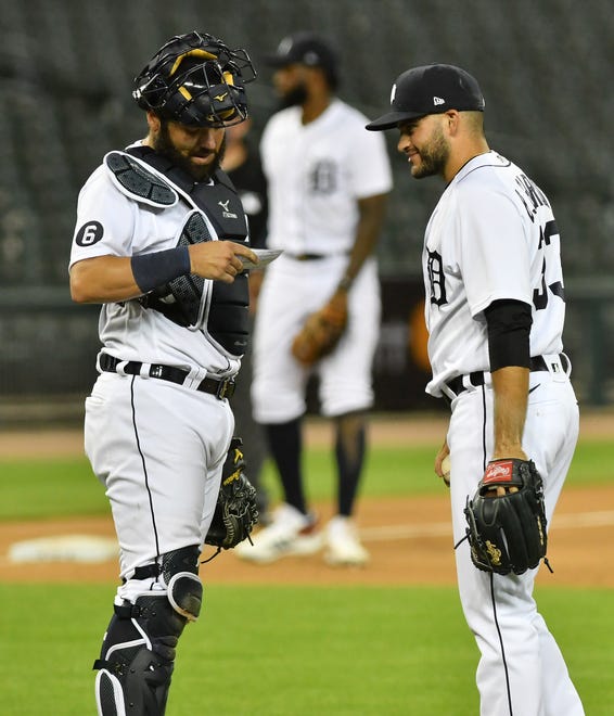Tigers catcher Austin Romine and pitcher Bryan Garcia talk during a review in the ninth inning.  Detroit Tigers vs Chicago White Sox at Comerica Park in Detroit on Aug. 10, 2020.