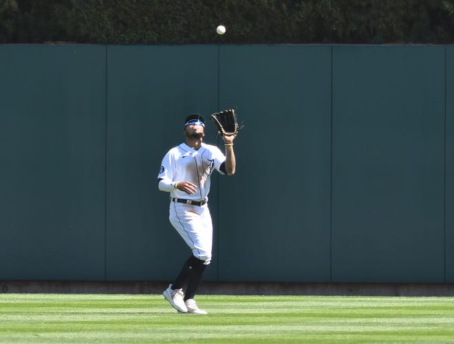Tigers center fielder Harold Castro makes a catch in the eighth inning.